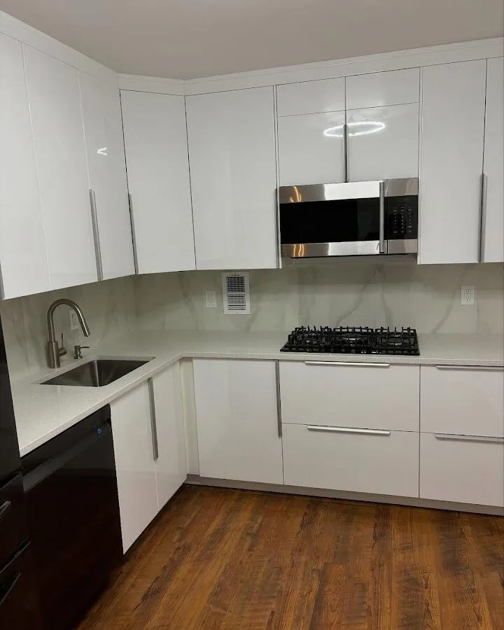 Restored kitchen with white cabinets after water damage in Keyport